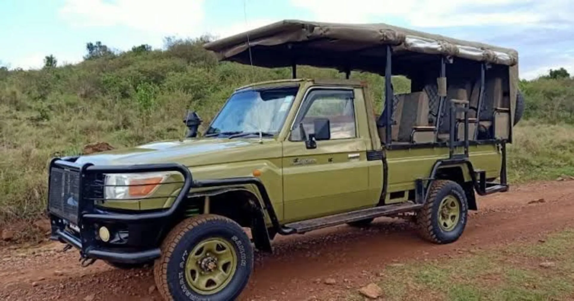 types of safari vehicle in africa open sided land cruiser