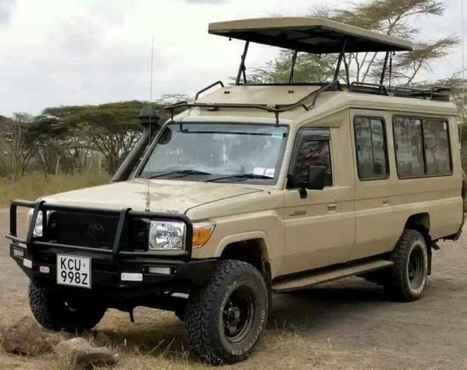 types of safari vehicle in africa pop up roof land cruiser